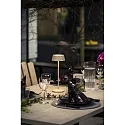 Konstsmide battery table lamp MENTON USB IP54, sand coloured, lacquered dimmable
